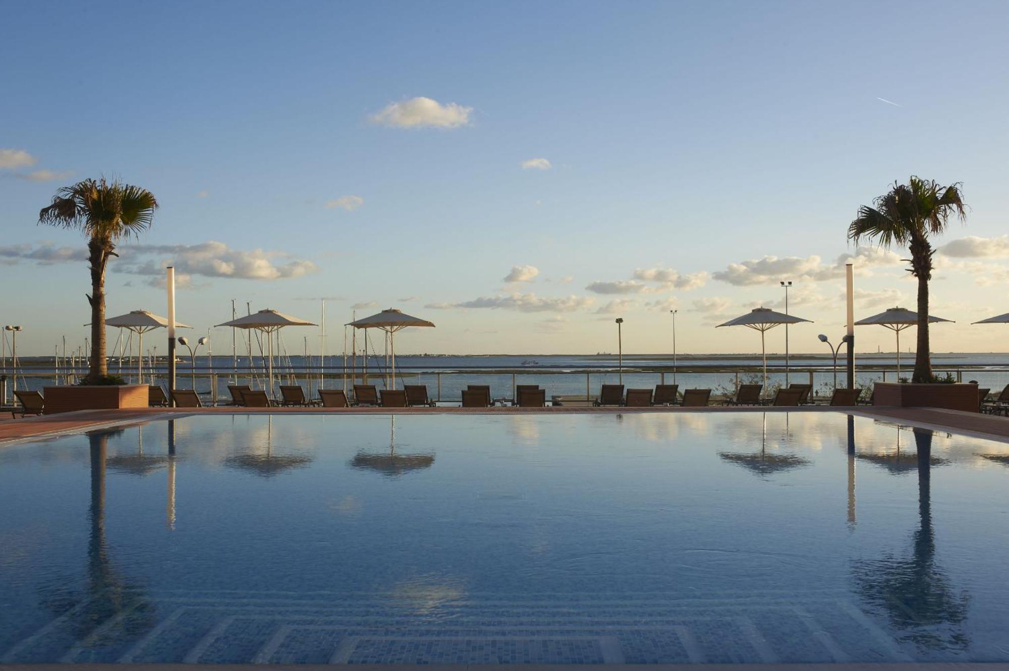 Real Marina Hotel & Spa Olhao Luaran gambar View of the pool at the hotel